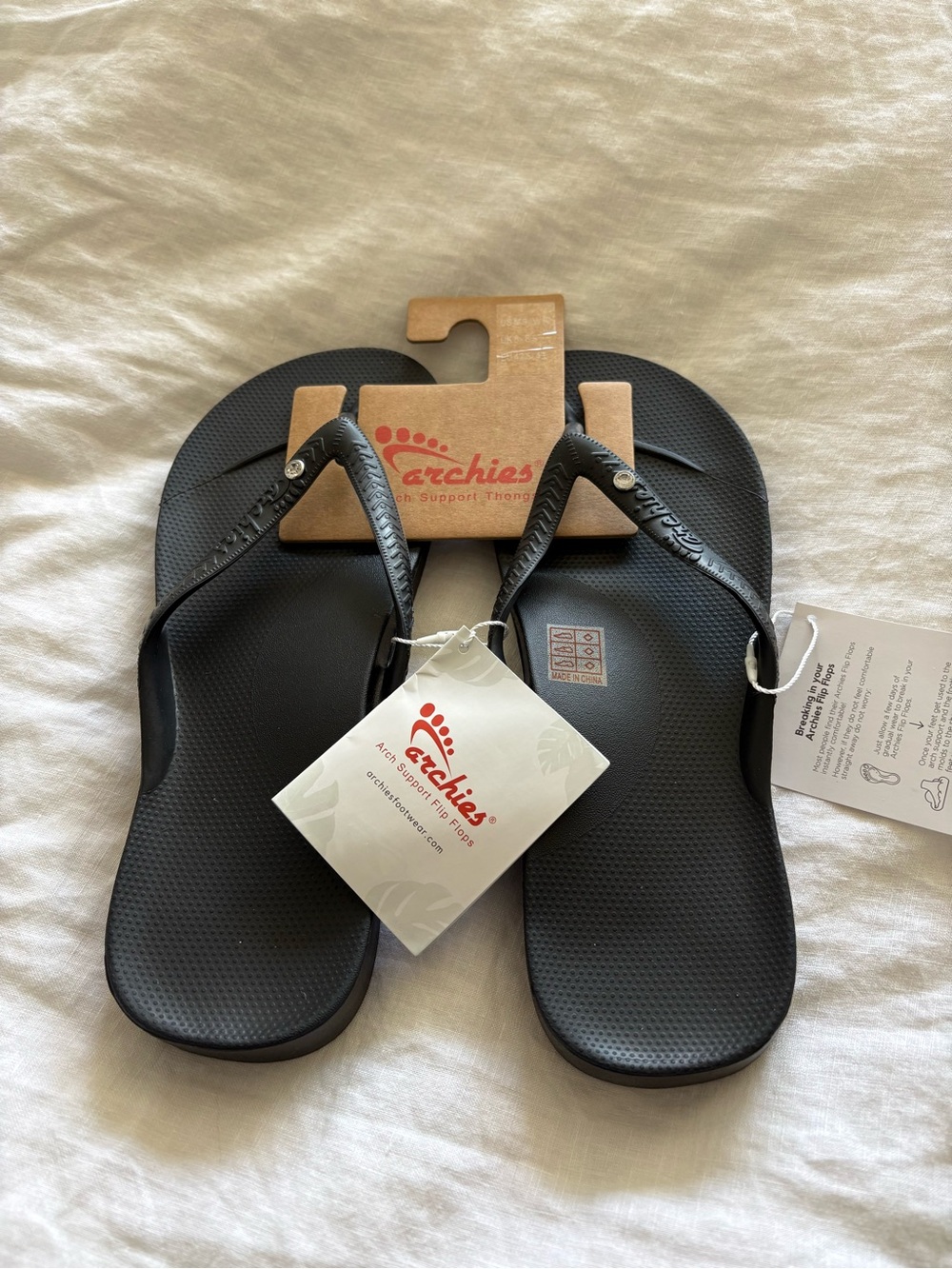 Archies NWT’s Women’s Black Flip Flop Sandals